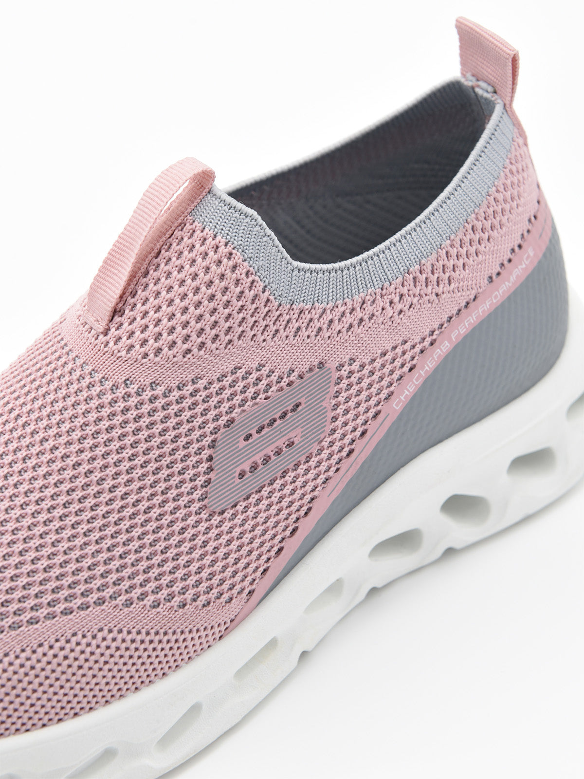 Zapatilla slip on rosa con suela ergonómica blanca