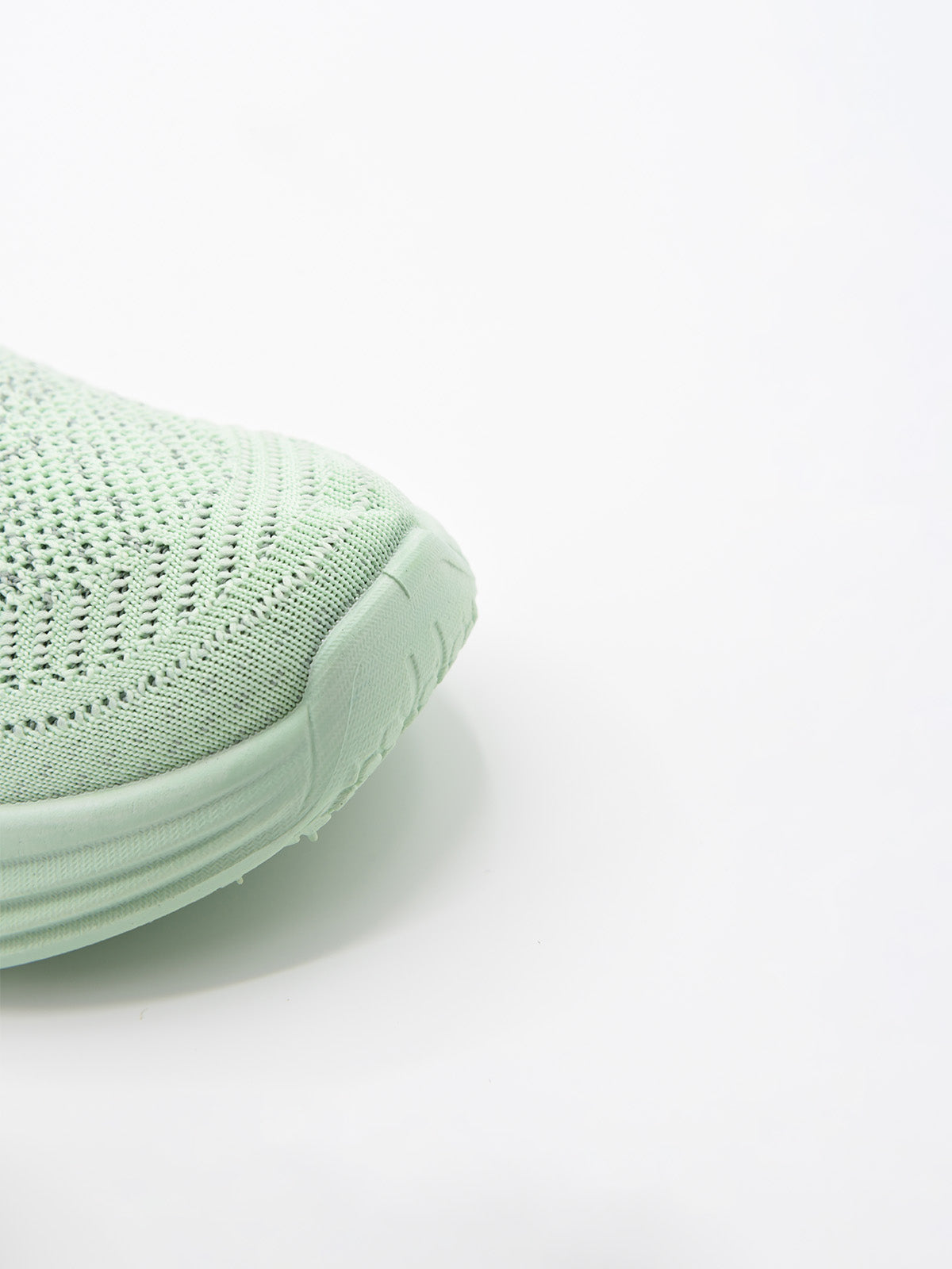 Zapatilla slip-on verde con suela gruesa